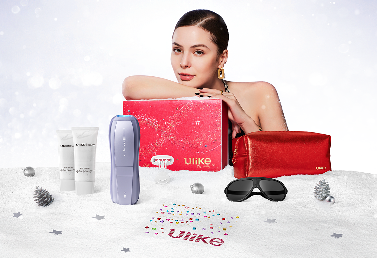Ulike IPL hair removal gift set with device, aloe gels, red gift box, cosmetic pouch, sunglasses, and razor in a winter-themed setting.